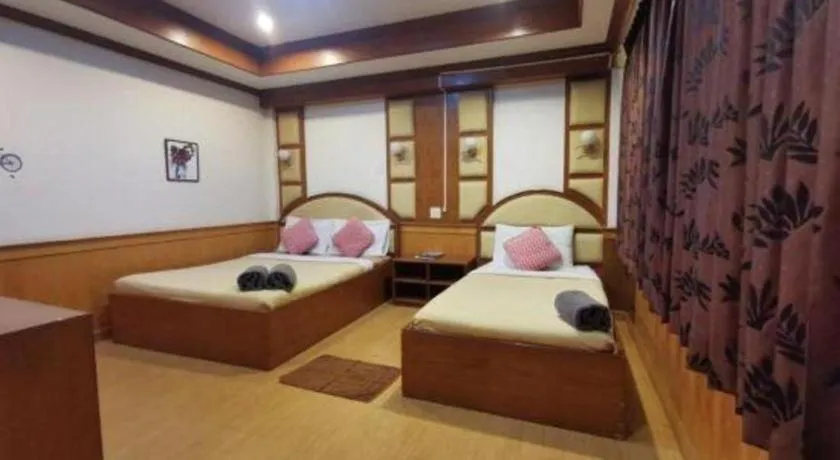 Bed in Supak Hotel