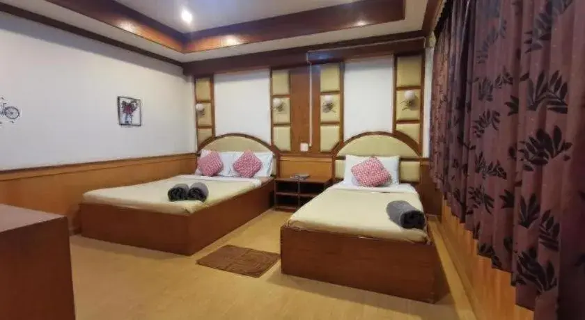 Bed in Supak Hotel Bed in Supak Hotel