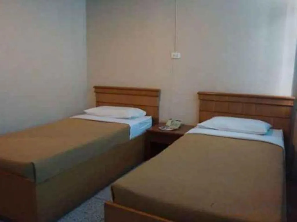 Bed in Supak Hotel