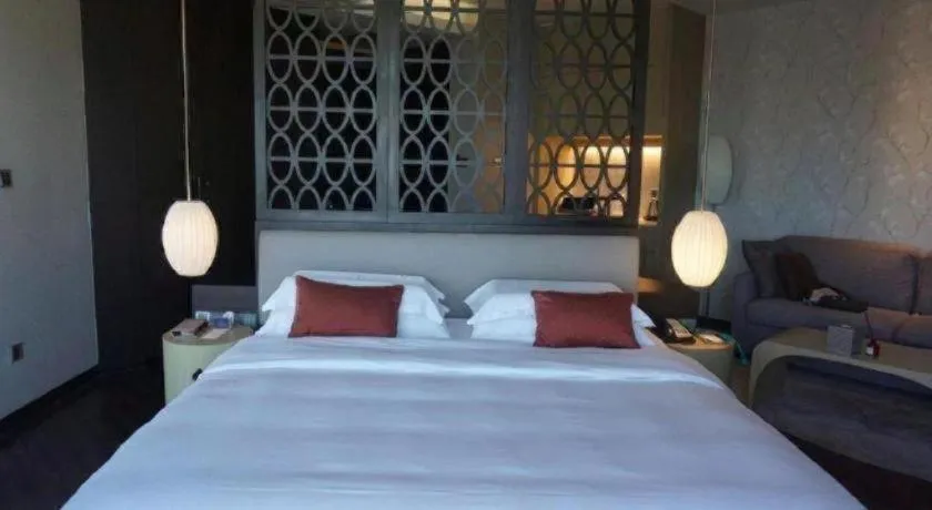 Bed in DongGuan JOYC Hotel 