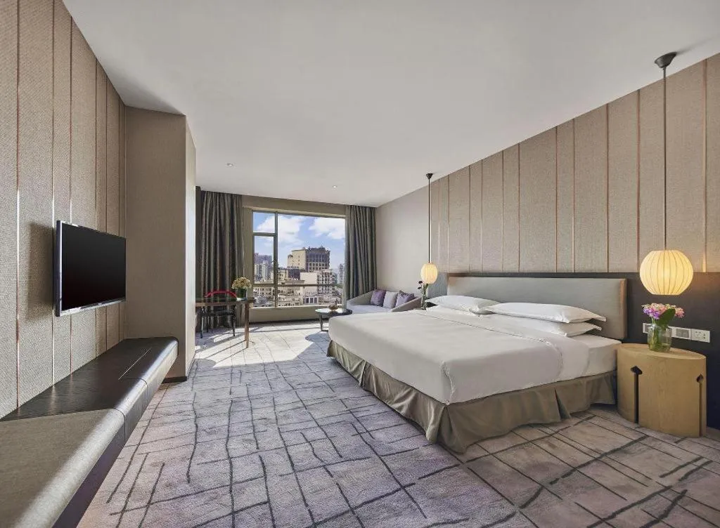 Bed in DongGuan JOYC Hotel 