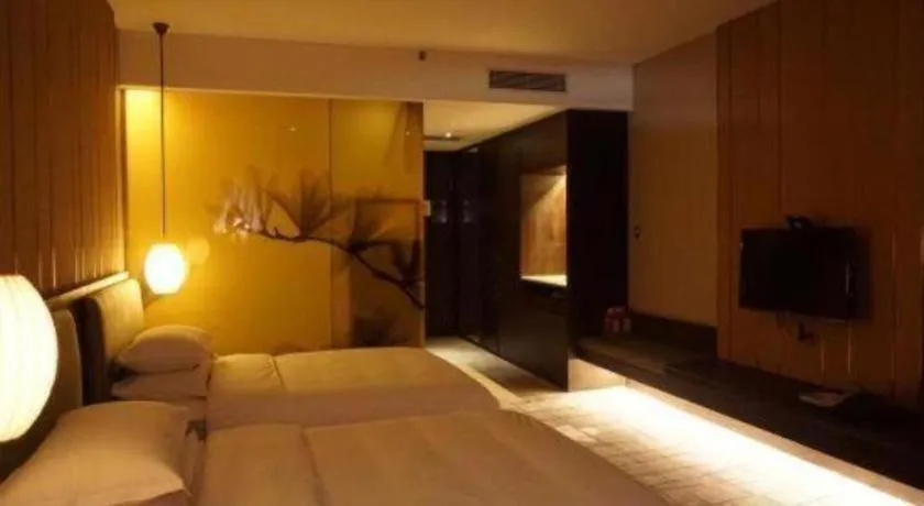 Bed in DongGuan JOYC Hotel 