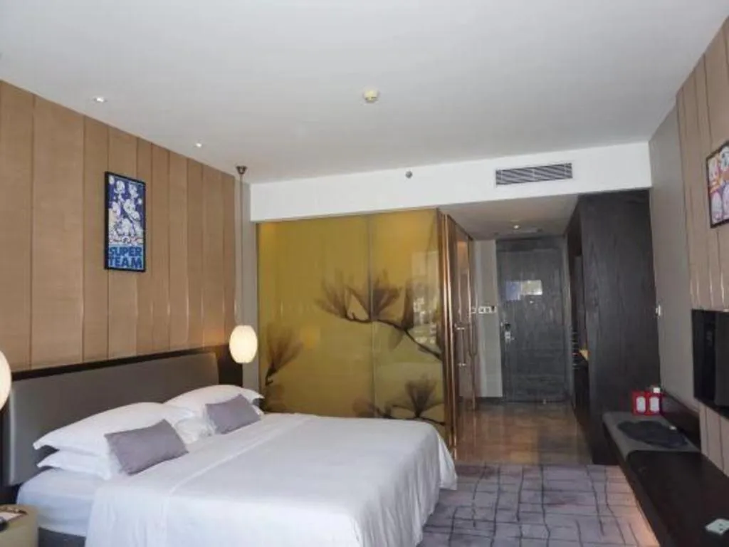 Bed in DongGuan JOYC Hotel 