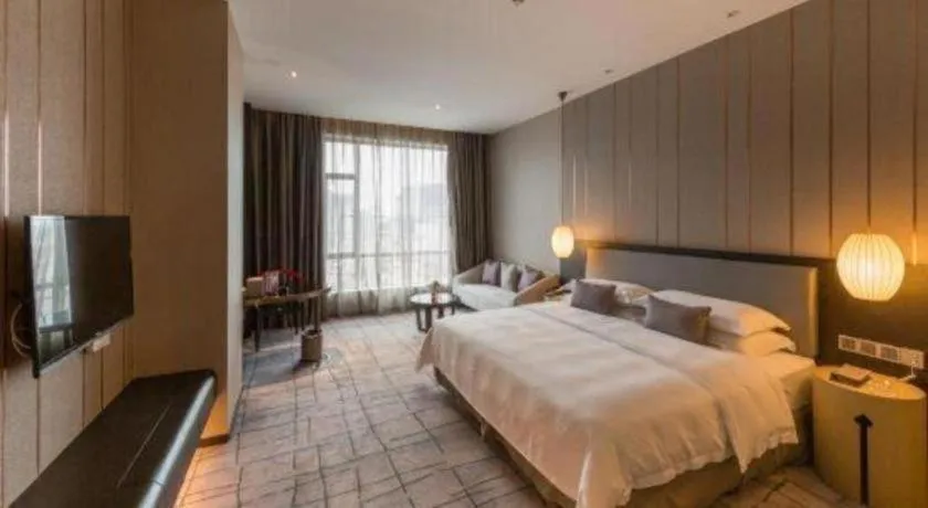 Bed in DongGuan JOYC Hotel 