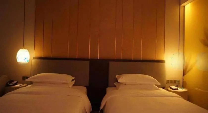 Bed in DongGuan JOYC Hotel 