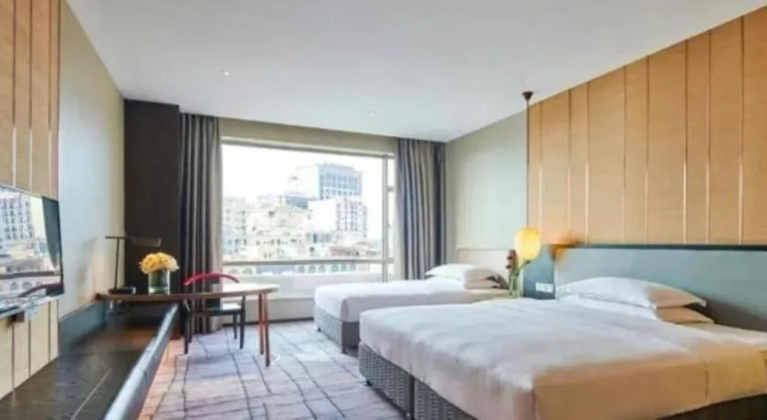 Bed in DongGuan JOYC Hotel 