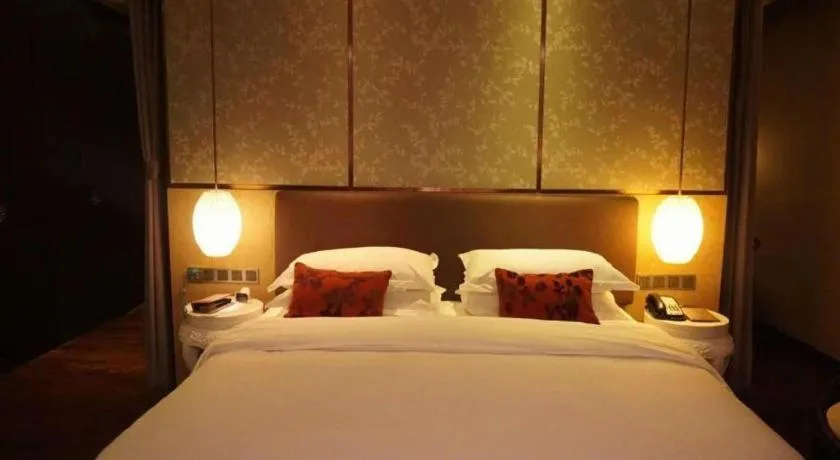 Bed in DongGuan JOYC Hotel 