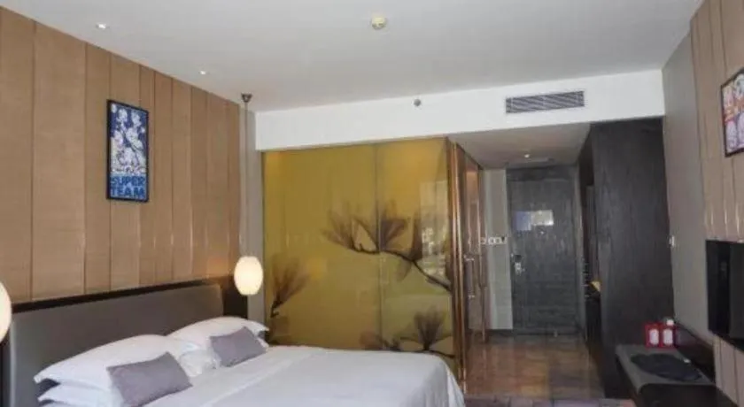 Bed in DongGuan JOYC Hotel 