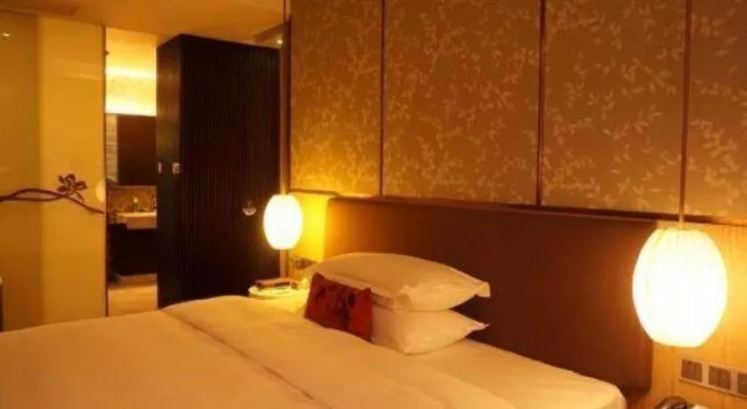 Bed in DongGuan JOYC Hotel 