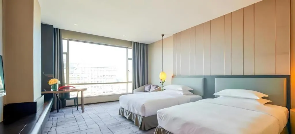 Bed in DongGuan JOYC Hotel 