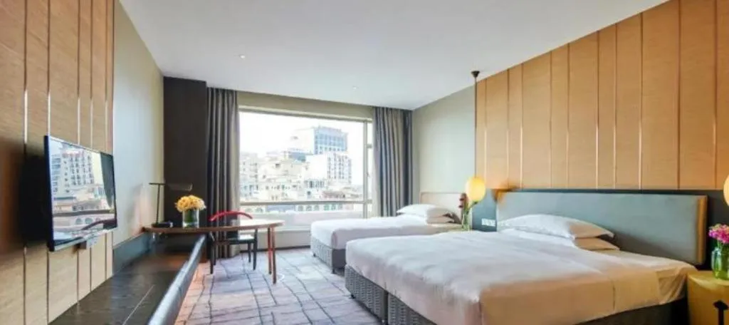 Bed in DongGuan JOYC Hotel 