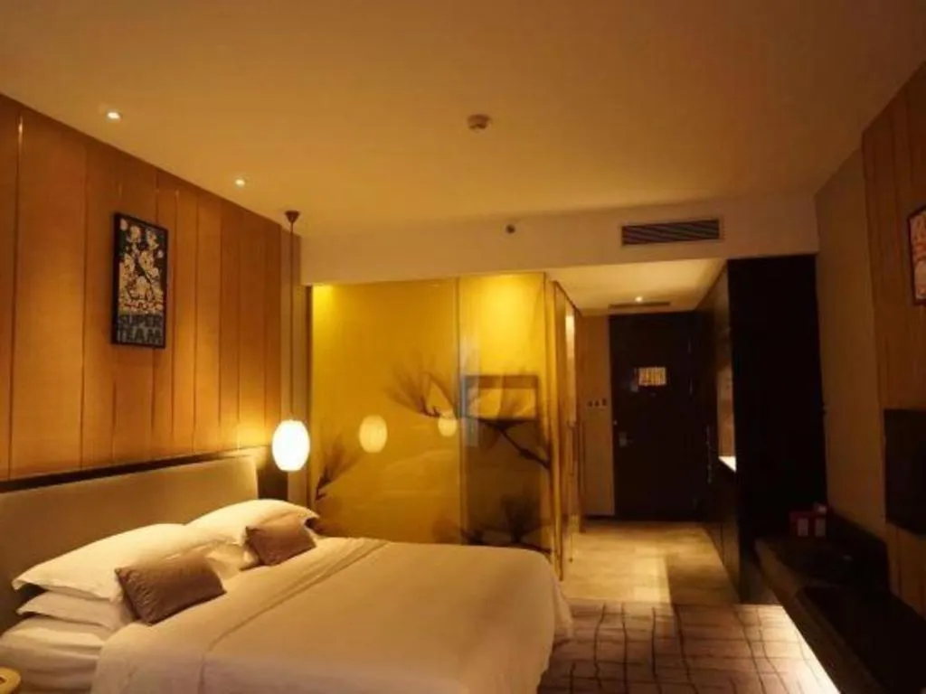 Bed in DongGuan JOYC Hotel 