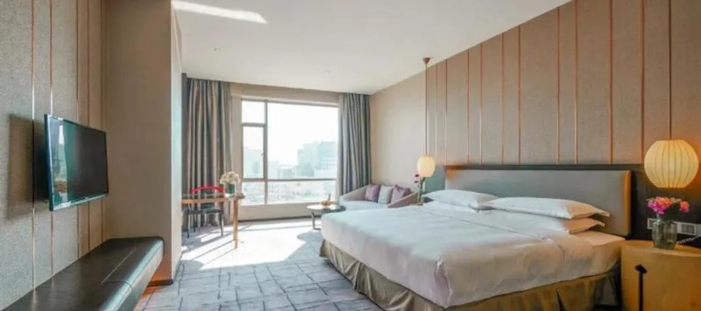 Bed in DongGuan JOYC Hotel 