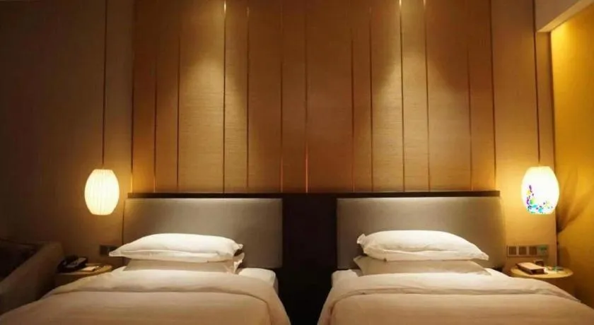 Bed in DongGuan JOYC Hotel 