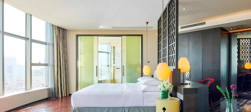 Bed in DongGuan JOYC Hotel 