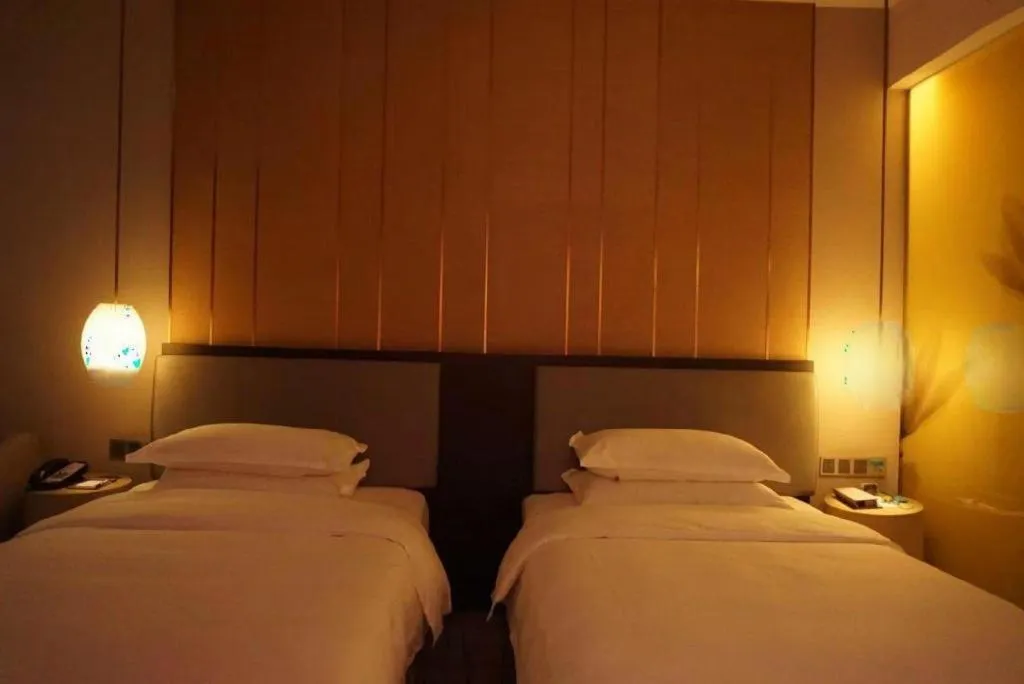 Bed in DongGuan JOYC Hotel 