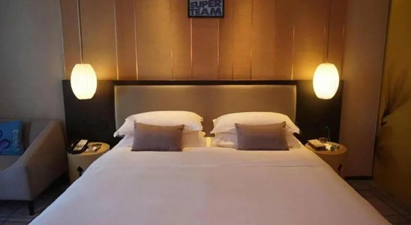Bed in DongGuan JOYC Hotel 