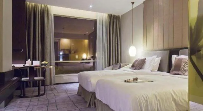 Bed in DongGuan JOYC Hotel 