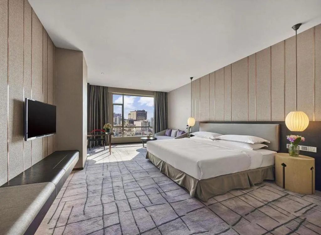 Bed in DongGuan JOYC Hotel 