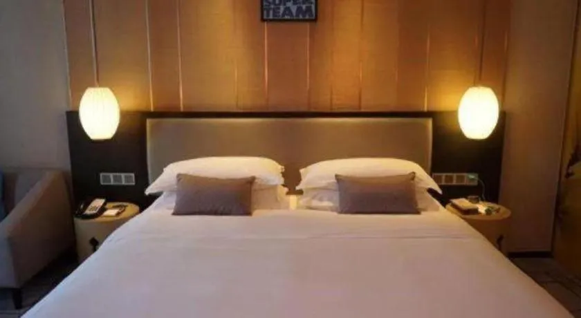 Bed in DongGuan JOYC Hotel 