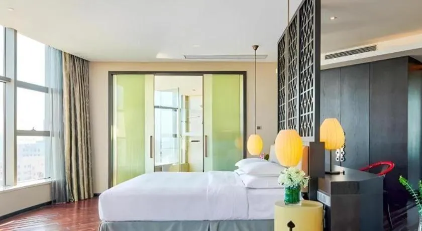 Bed in DongGuan JOYC Hotel 