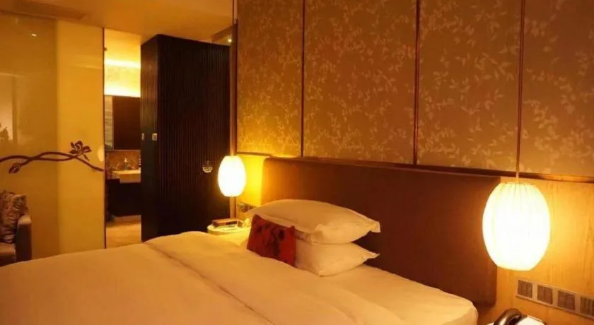 Bed in DongGuan JOYC Hotel 