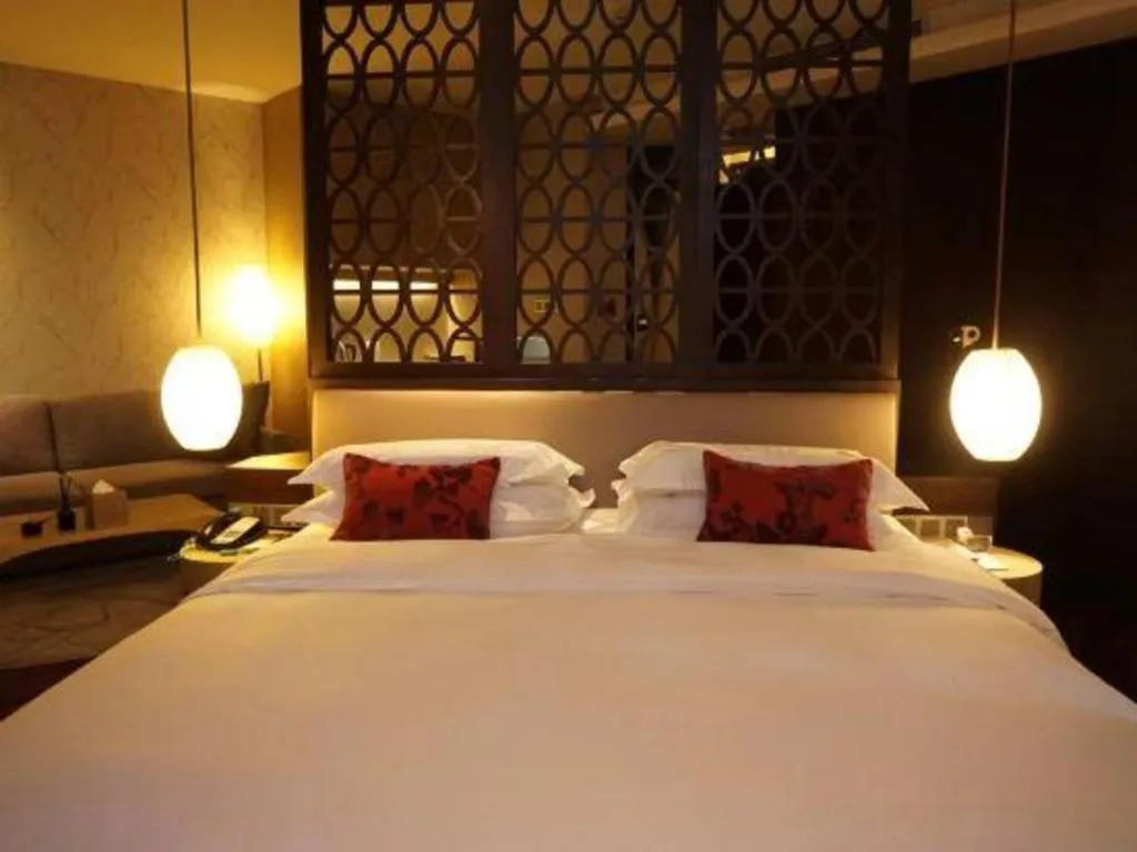 Bed in DongGuan JOYC Hotel 