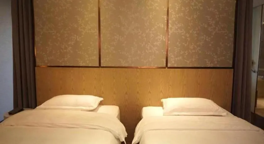 Bed in DongGuan JOYC Hotel 