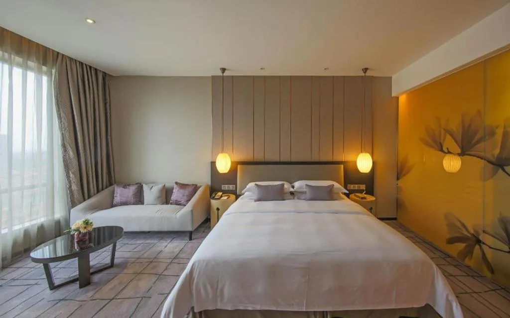 Bed in DongGuan JOYC Hotel 