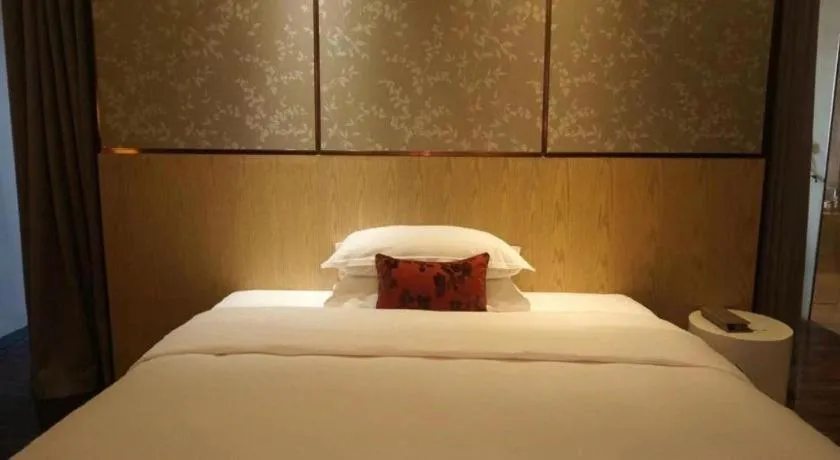 Bed in DongGuan JOYC Hotel 
