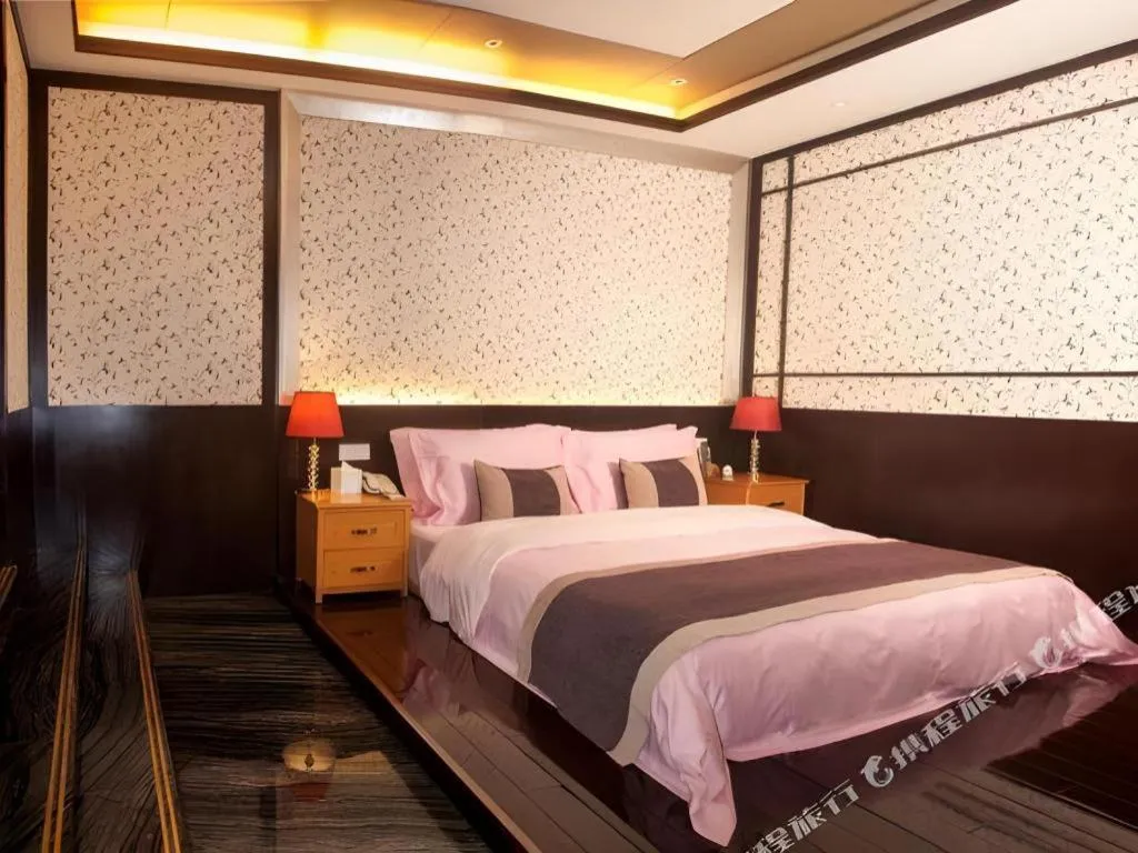 Bed in Eurasia International Hotel