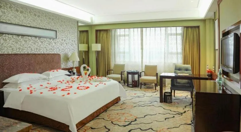 Bed in Eurasia International Hotel