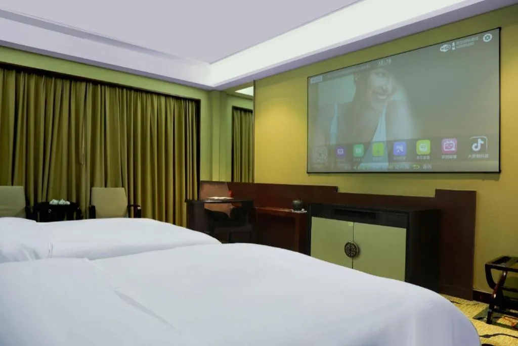 Bed in Eurasia International Hotel