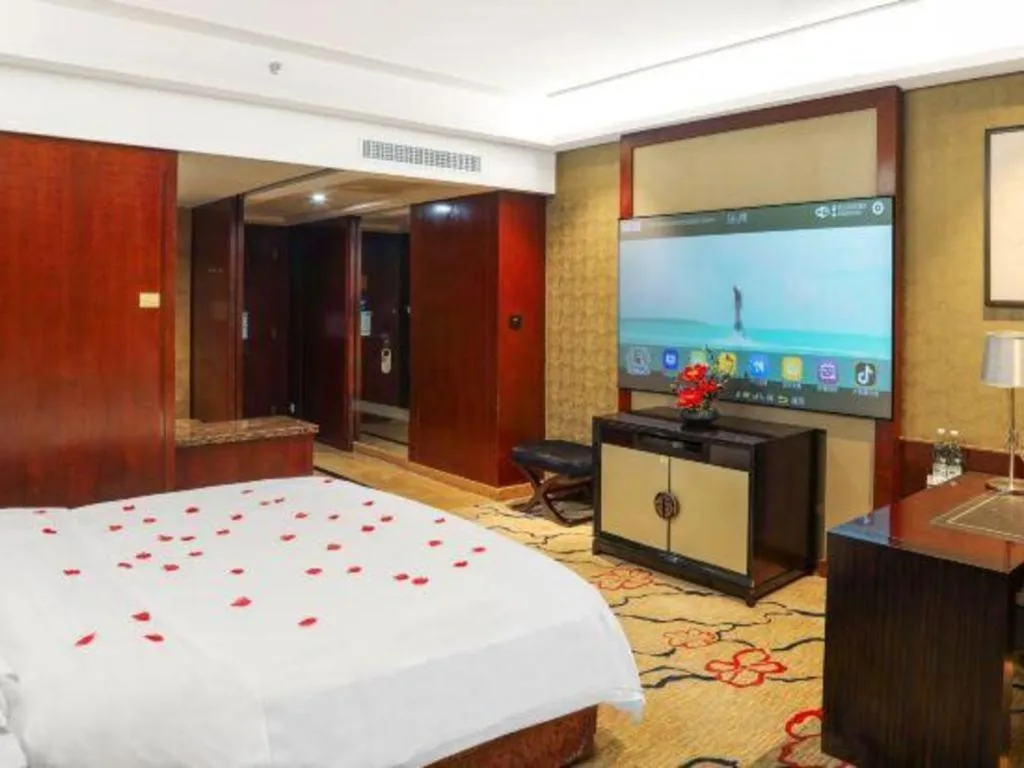 Bed in Eurasia International Hotel