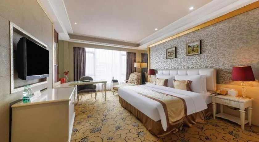 Bed in Eurasia International Hotel