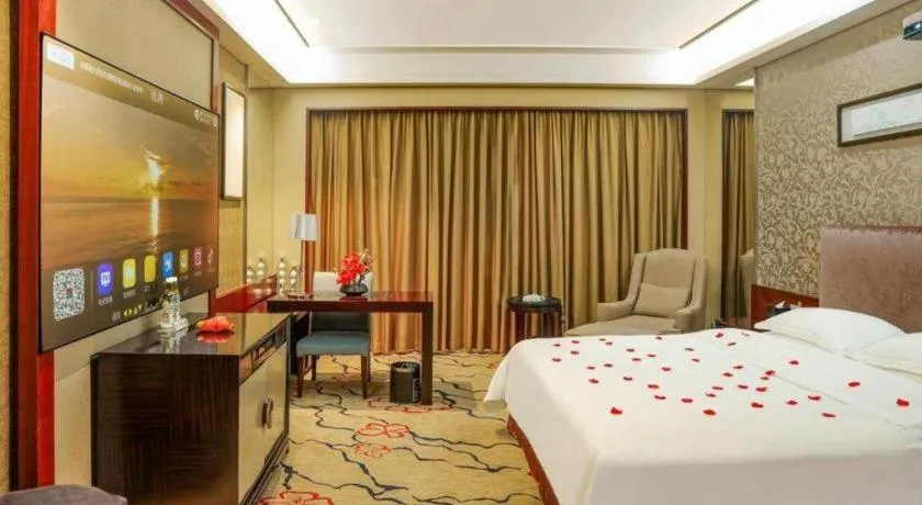 Bed in Eurasia International Hotel