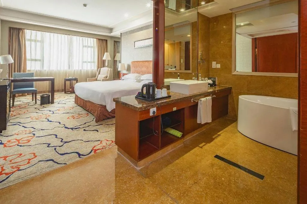 Bed in Eurasia International Hotel