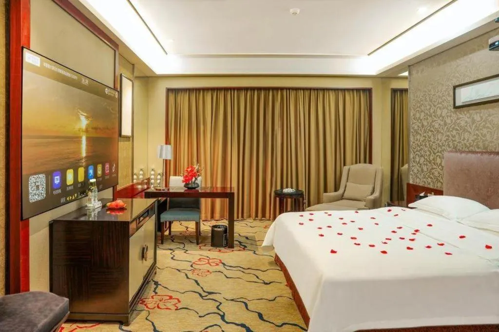 Bed in Eurasia International Hotel