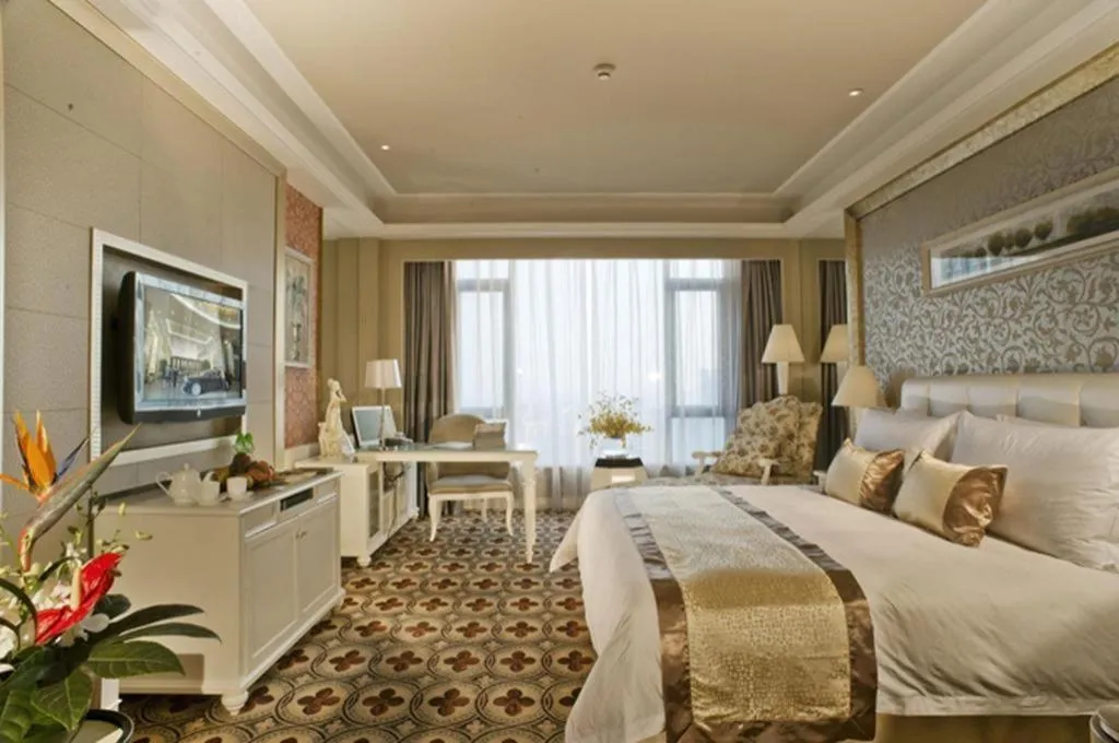 Bed in Eurasia International Hotel