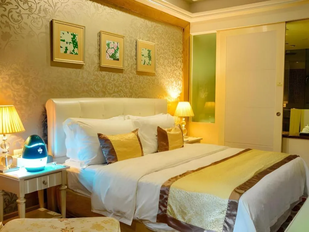 Bed in Eurasia International Hotel