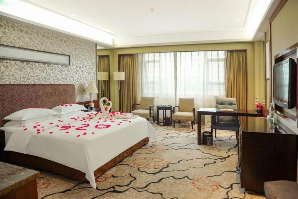 Bed in Eurasia International Hotel