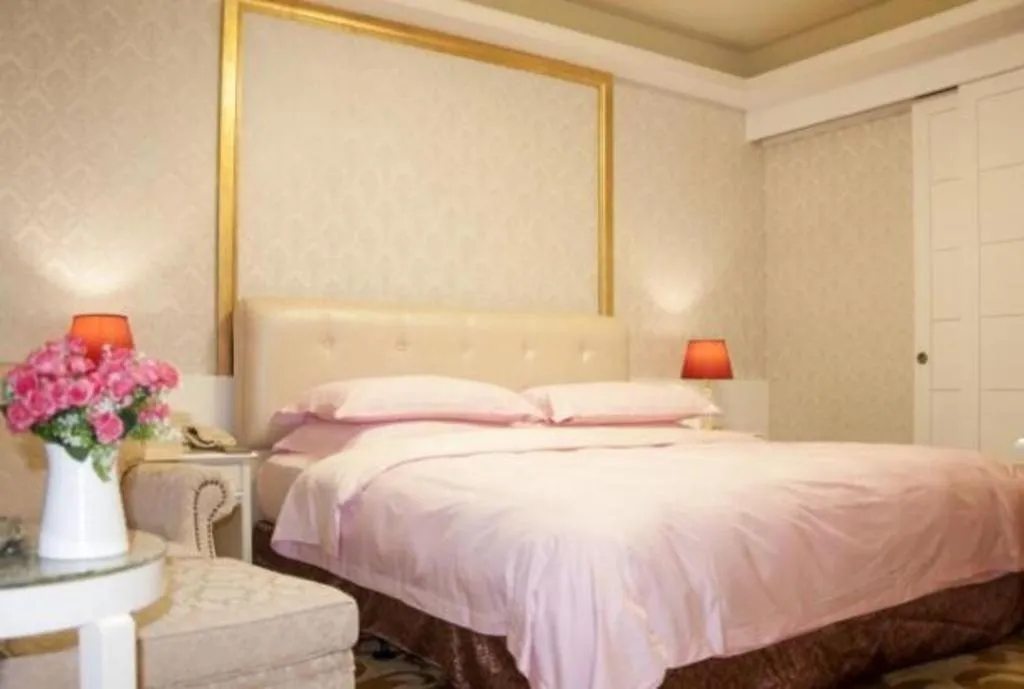 Bed in Eurasia International Hotel