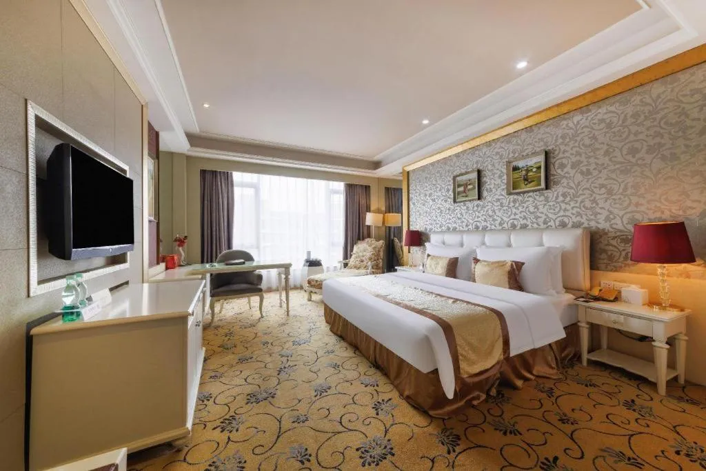 Bed in Eurasia International Hotel