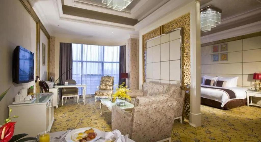 Bed in Eurasia International Hotel