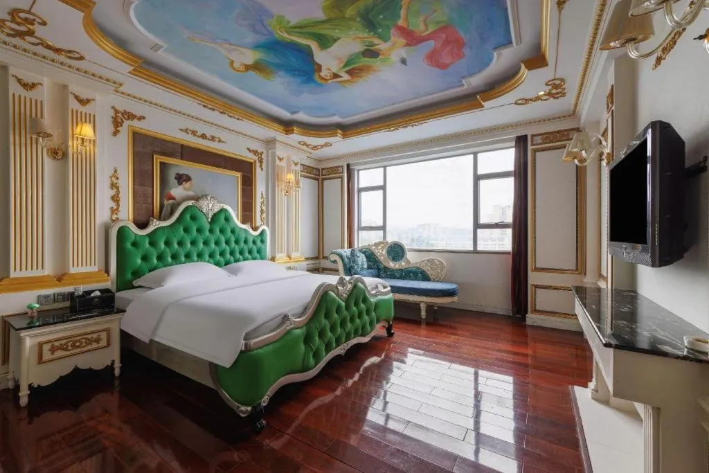 Bed in Eurasia International Hotel