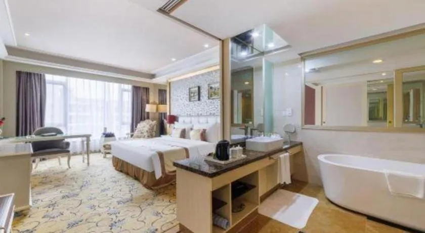 Bed in Eurasia International Hotel