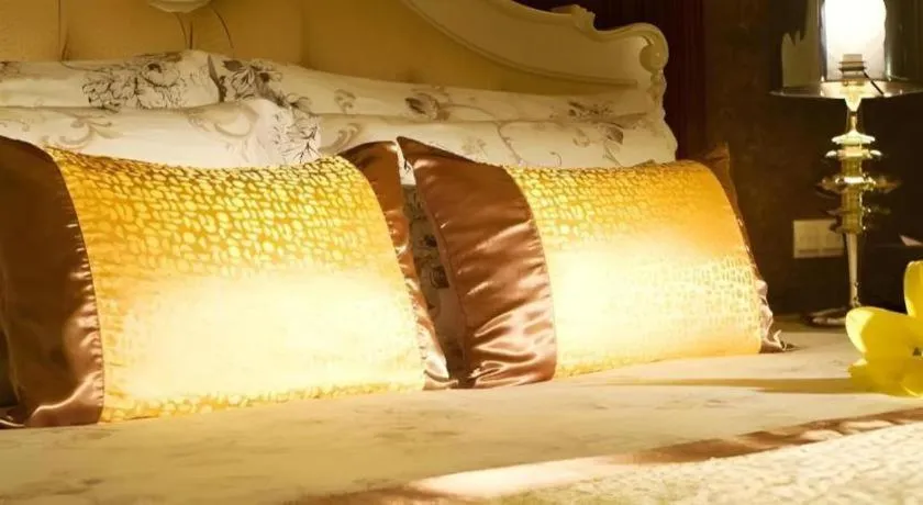 Bed in Eurasia International Hotel