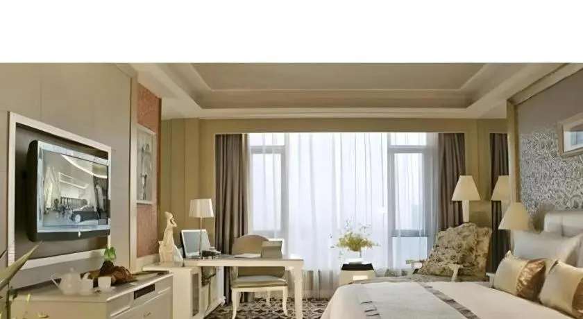 Bed in Eurasia International Hotel