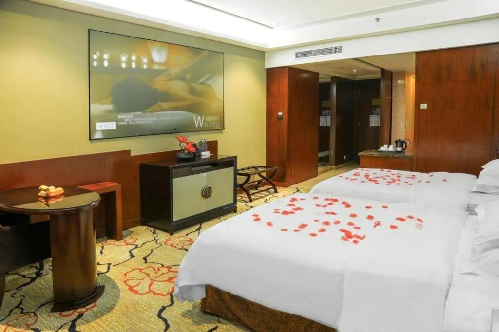 Bed in Eurasia International Hotel