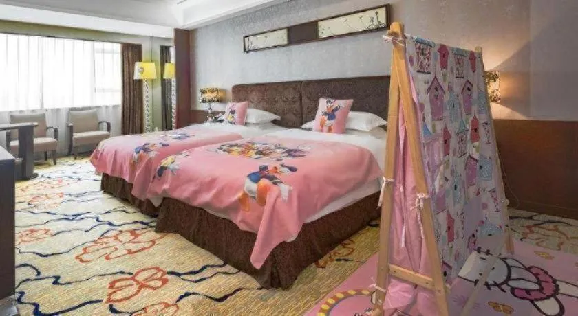 Bed in Eurasia International Hotel